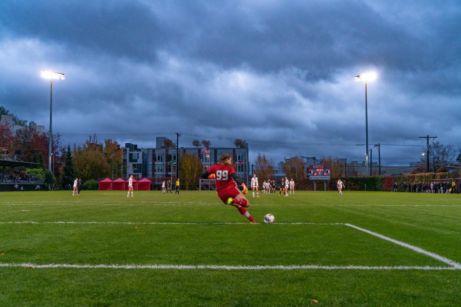 Senior Jessica Berlin kicks the ball downfield from the goalie box. 