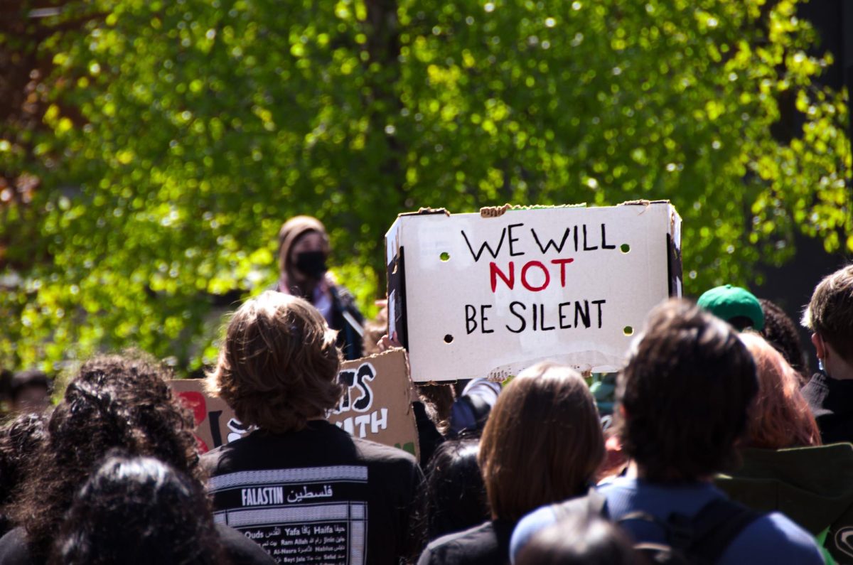 A sign held up at the demonstration in 12th Avenue Square Park.