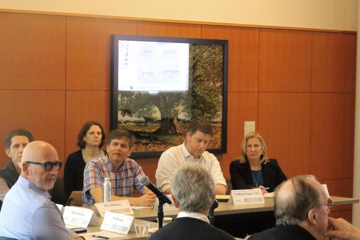 The IAC pauses their presentation to allow students to voice their questions and opinions.